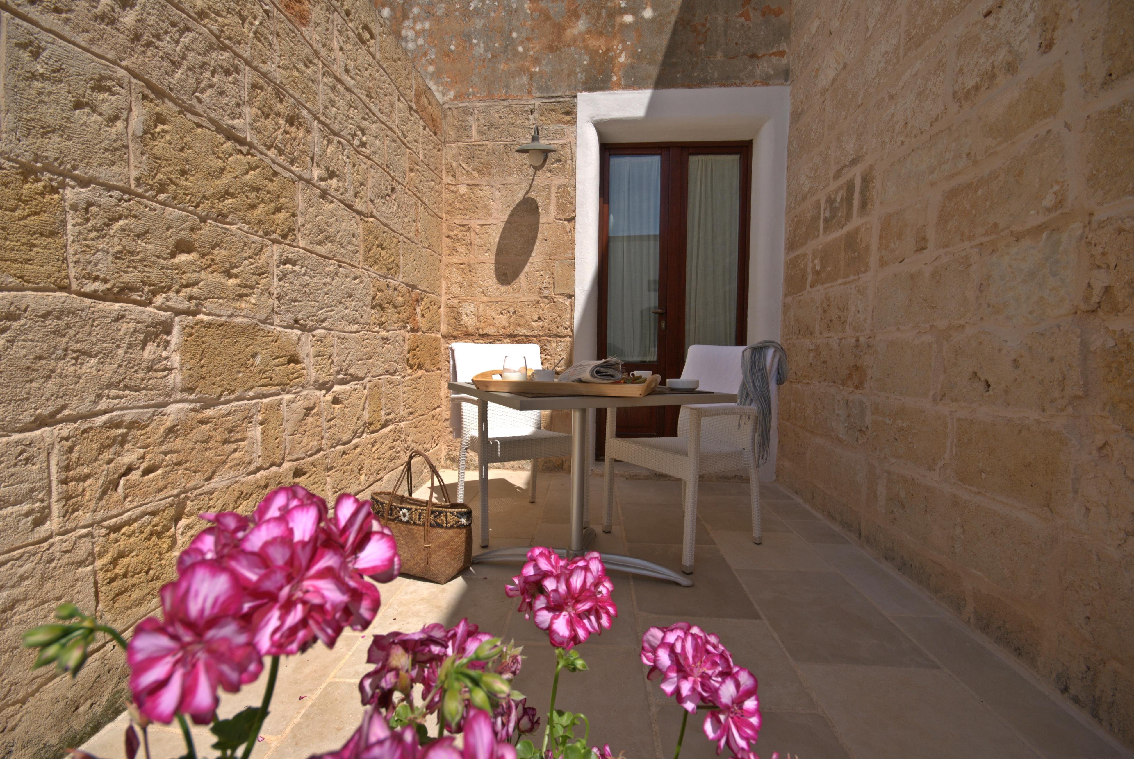 Masseria Corda Di Lana Hotel & Resort Torre Lapillo Exterior foto